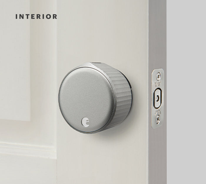 A silver August Wifi lock