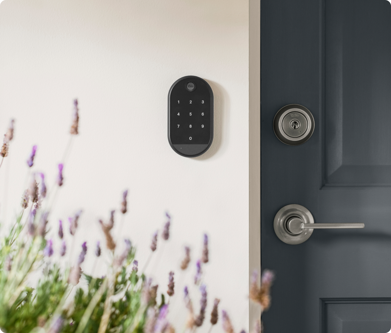 smart keypad installed next to a door