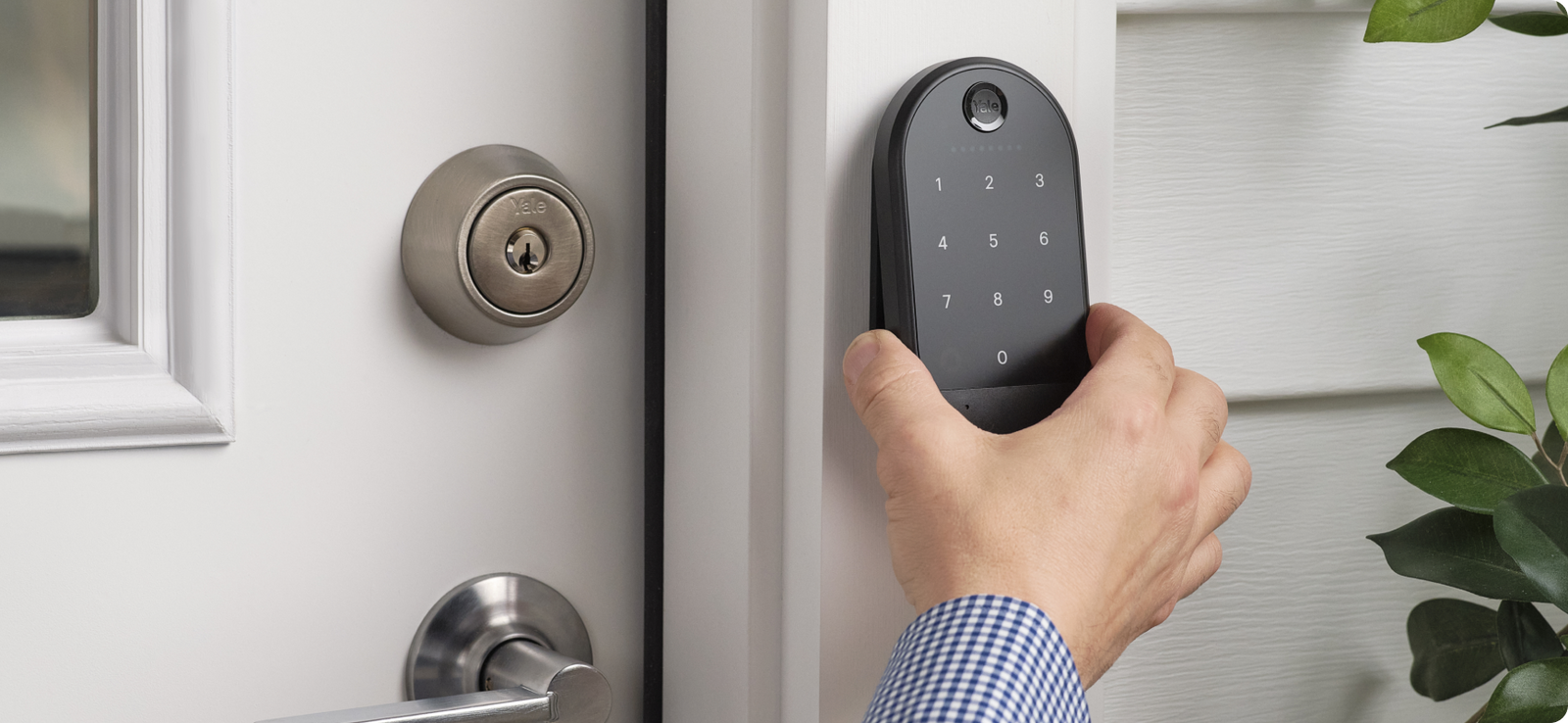 hand installing the smart keypad