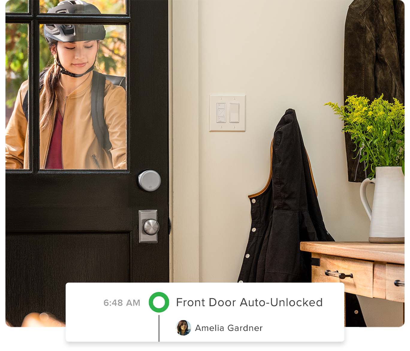 A woman entering her home with the door auto unlock when it receives her wifi signal 