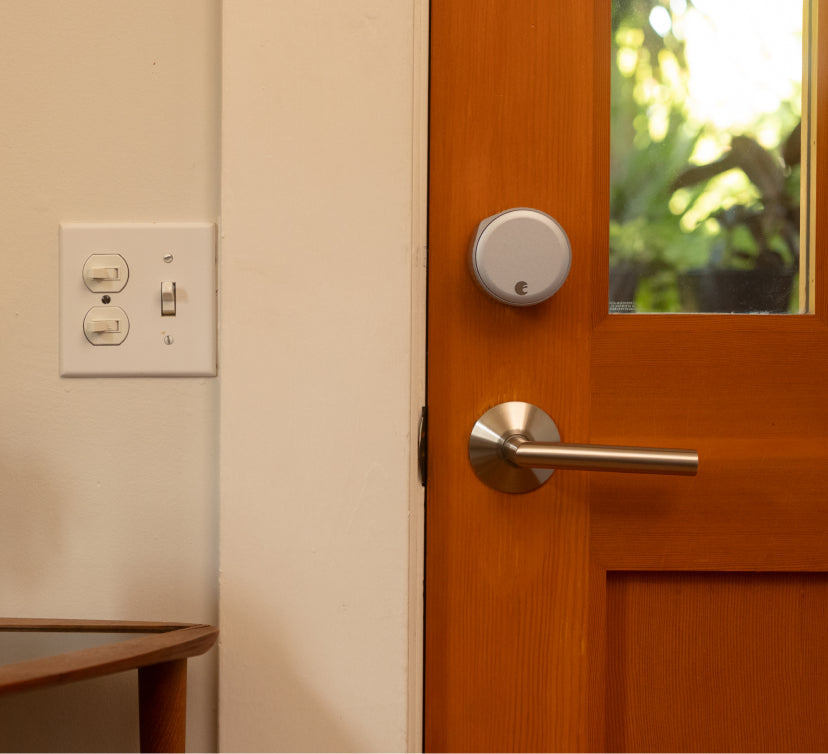 inside of home at dusk with secure smart lock on door
