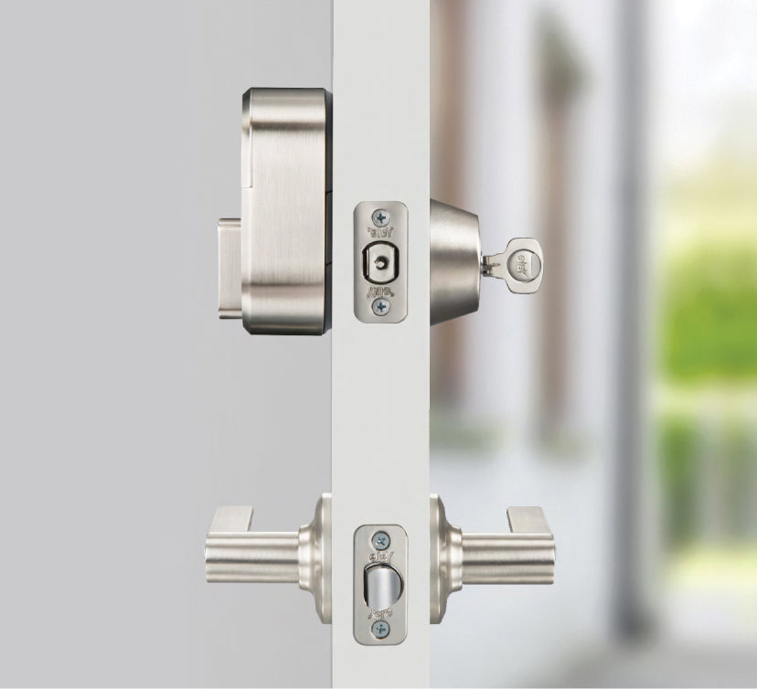 Side view of a Yale lock and door handle installed on the door