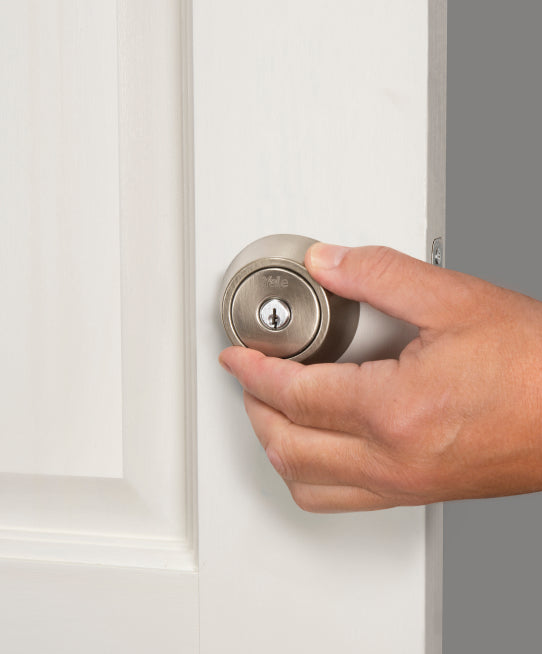 Yale keyed lock installed on a door 